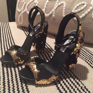 New gold & black Steve Madden heels. Cute